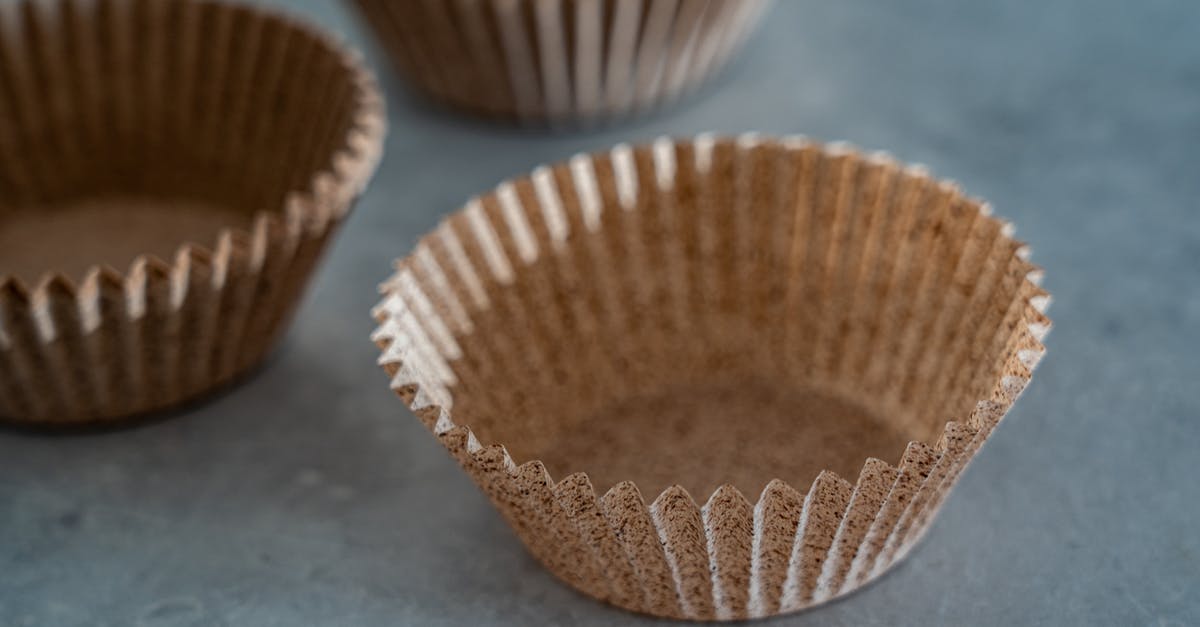 Muffin sticks to paper cases - Empty Brown Cupcake Cups