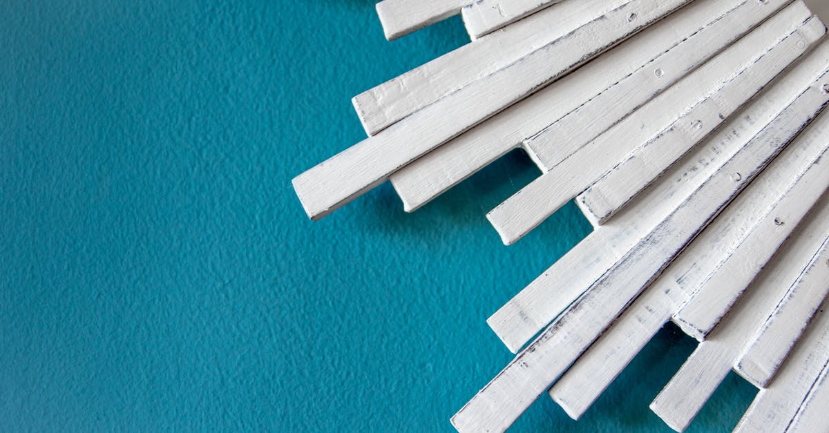 Muffin sticks to paper cases - White Wooden Blocks on Blue Surface