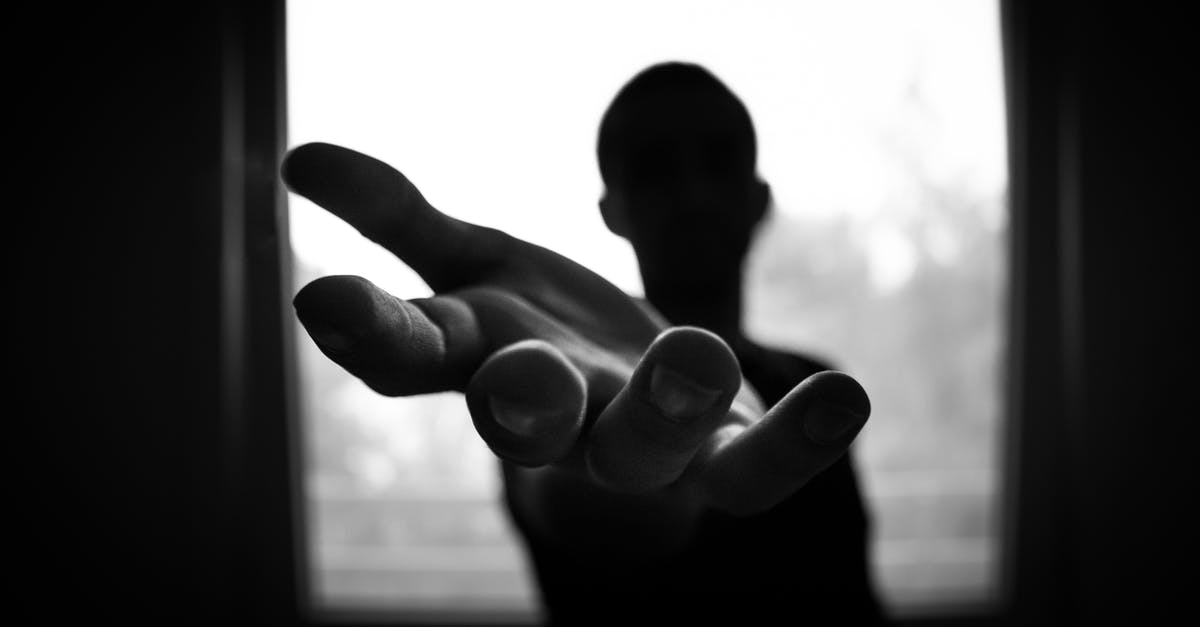 Multilayered brownie help - Man's Hand in Shallow Focus and Grayscale Photography