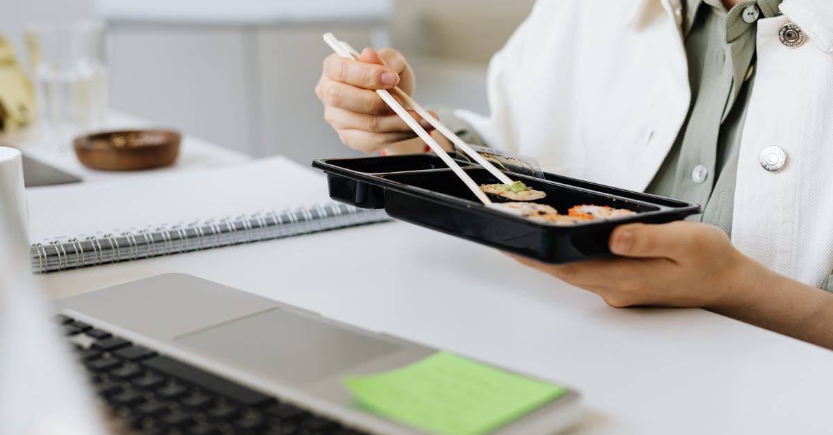 Mushy sushi surimi texture? - Person Holding Black and White Pen