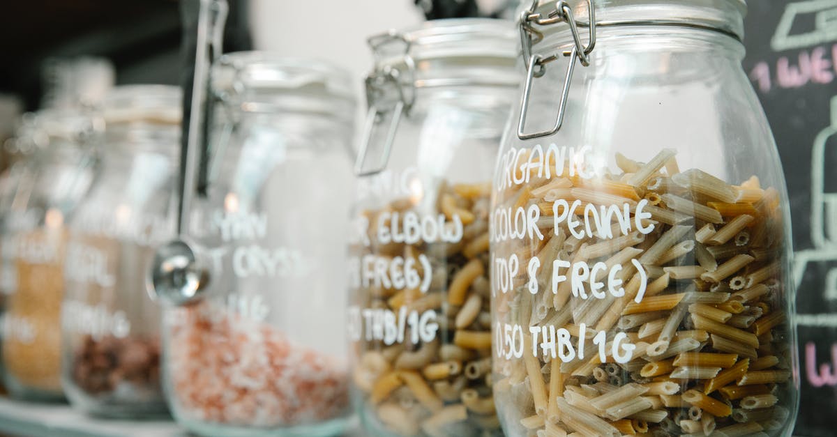 Must I store uncooked pasta in an airtight container? - Set of glass jars with pasta and various products