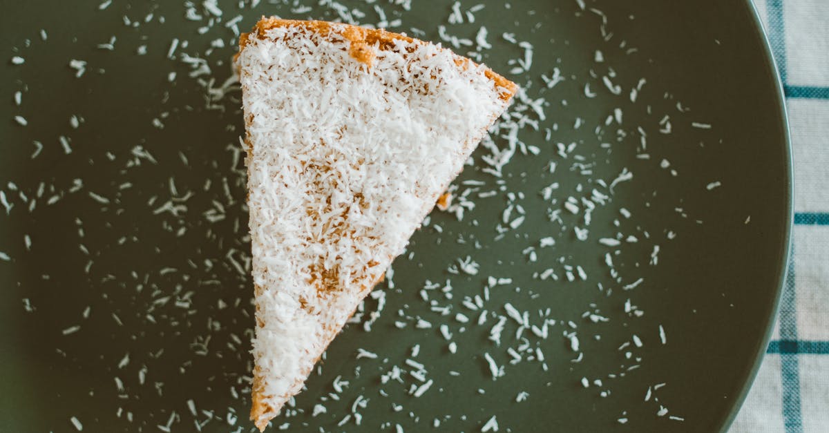 My cake is moist but crumbly - White and Brown Bread on Black Surface