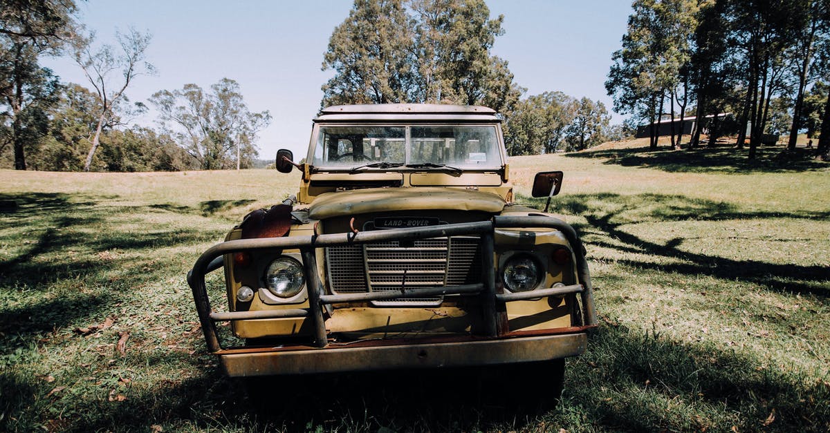 My cast iron has become flaky, did I damage it? - Grunge abandoned car left on grassy meadow