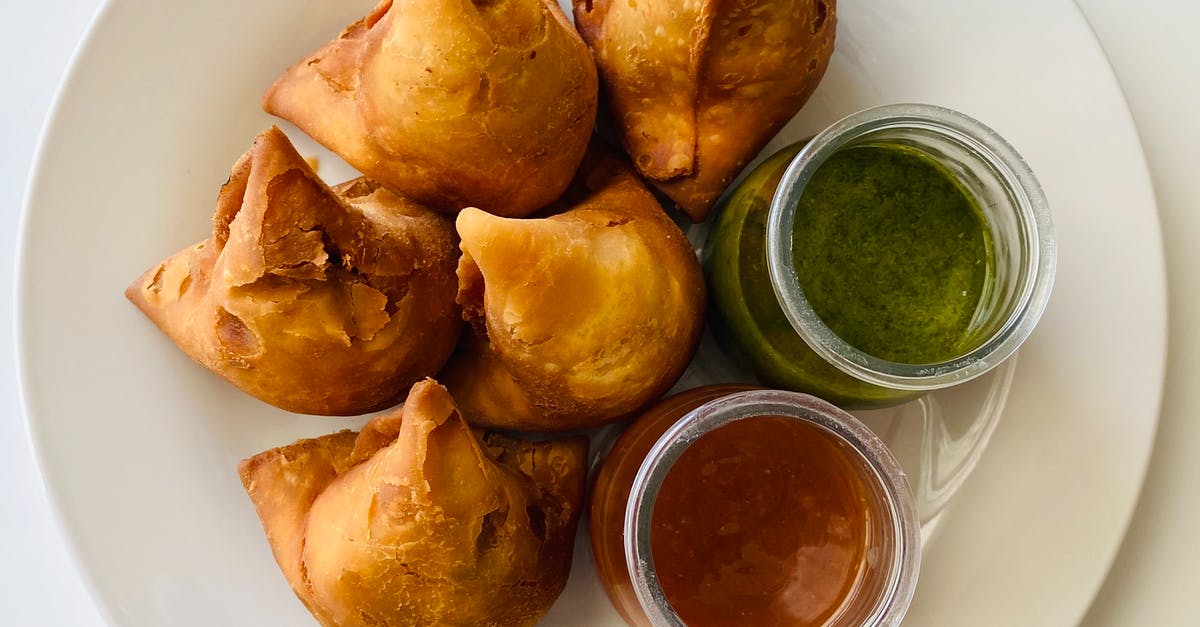 My chutney will not freeze, help! - Crunchy Samosa over a Ceramic Plate