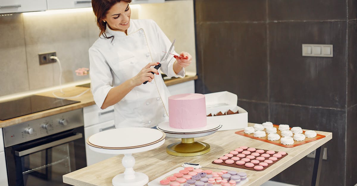 My crumb cake topping isn't working - Happy woman preparing kitchen tools during process of making delicious desserts in confectionery