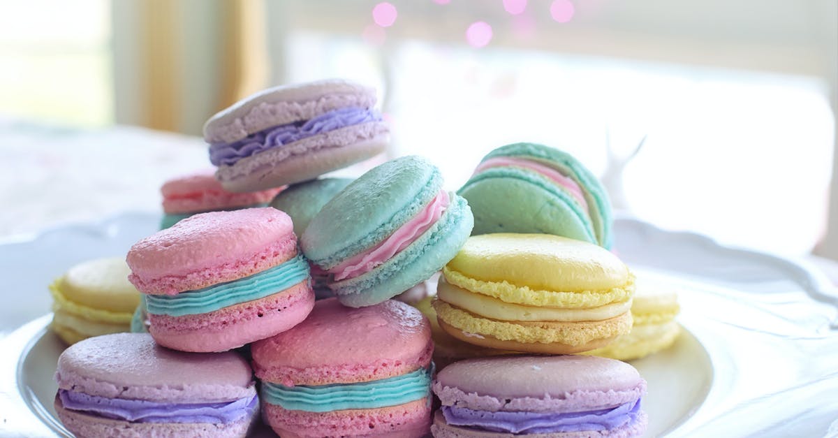 My Italian meringue macarons won’t stop coming out hollow [duplicate] - Colorful Macarons on White Ceramic Plate For Easter