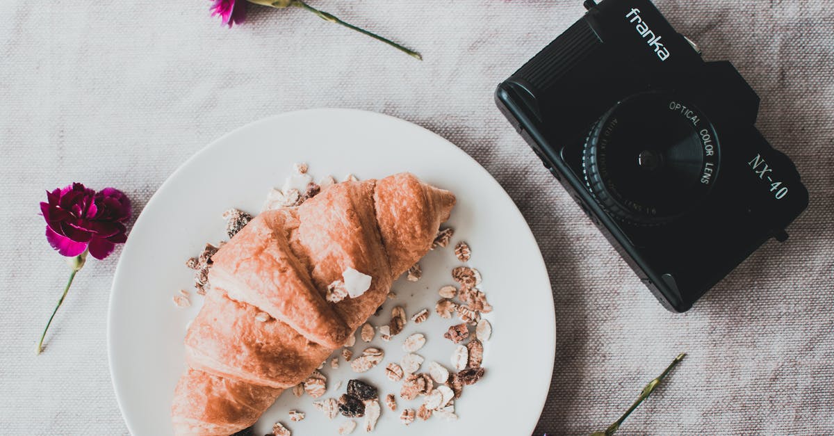 My oat bread is drier than the Sahara - Black Franka Dslr Camera Beside Croissant