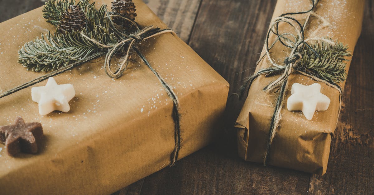 My Shrink Wrapped Steaks are Brown when I thaw them! - Photo of Two Brown Wrapped Gifts on Wooden Table