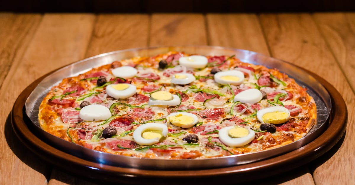 Name for a flour-free onion sauce - Pizza Meal on Stainless Steel Tray