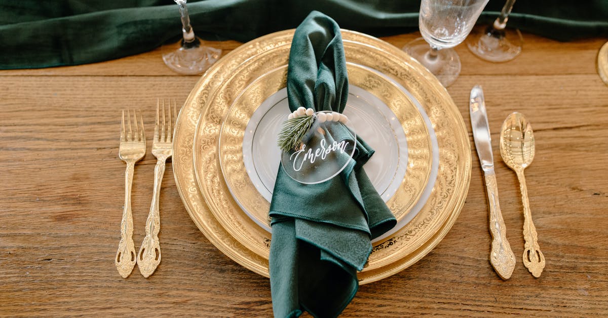 Name of this jar? - Table setting with elegant tableware and personalized napkin ring