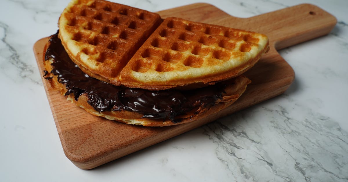 Nestle Cream "Ashta" - Waffle on Brown Wooden Chopping Board