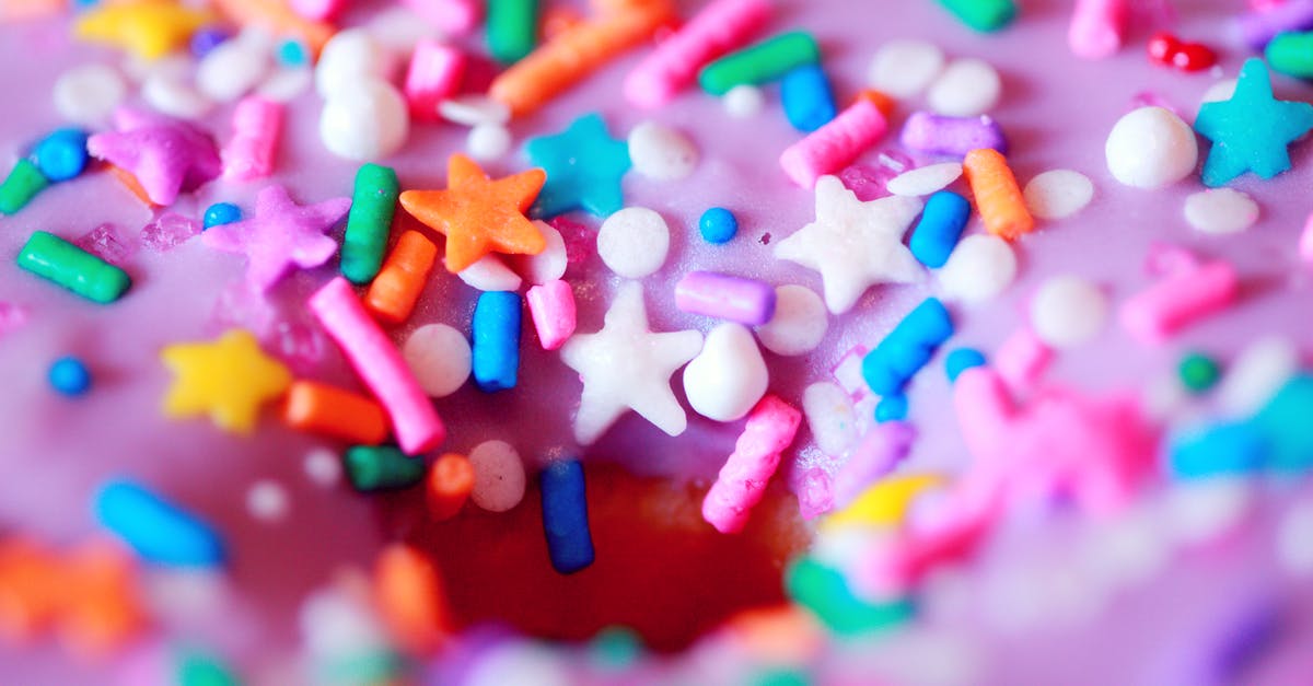 No Shortening and No Refrigeration, Buttercream Frosting - Doughnut Topped with Colorful Sprinkles in Tilt-Shift Lens 