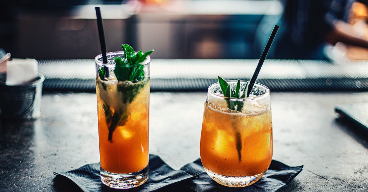 Non-alcoholic mint julep? - Two Brown Liquid Inside Clear Drinking Glasses