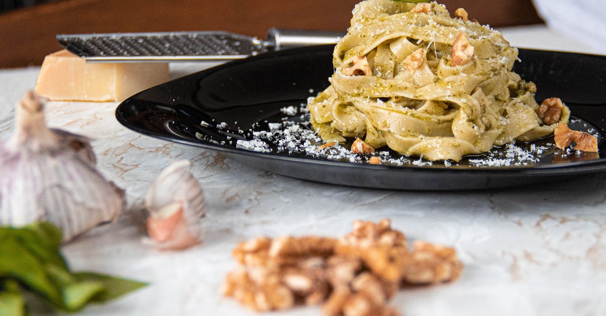 Non-cow's milk replacement for Parmesan cheese in Genovese pesto - Pasta Pesto on Ceramic Plate