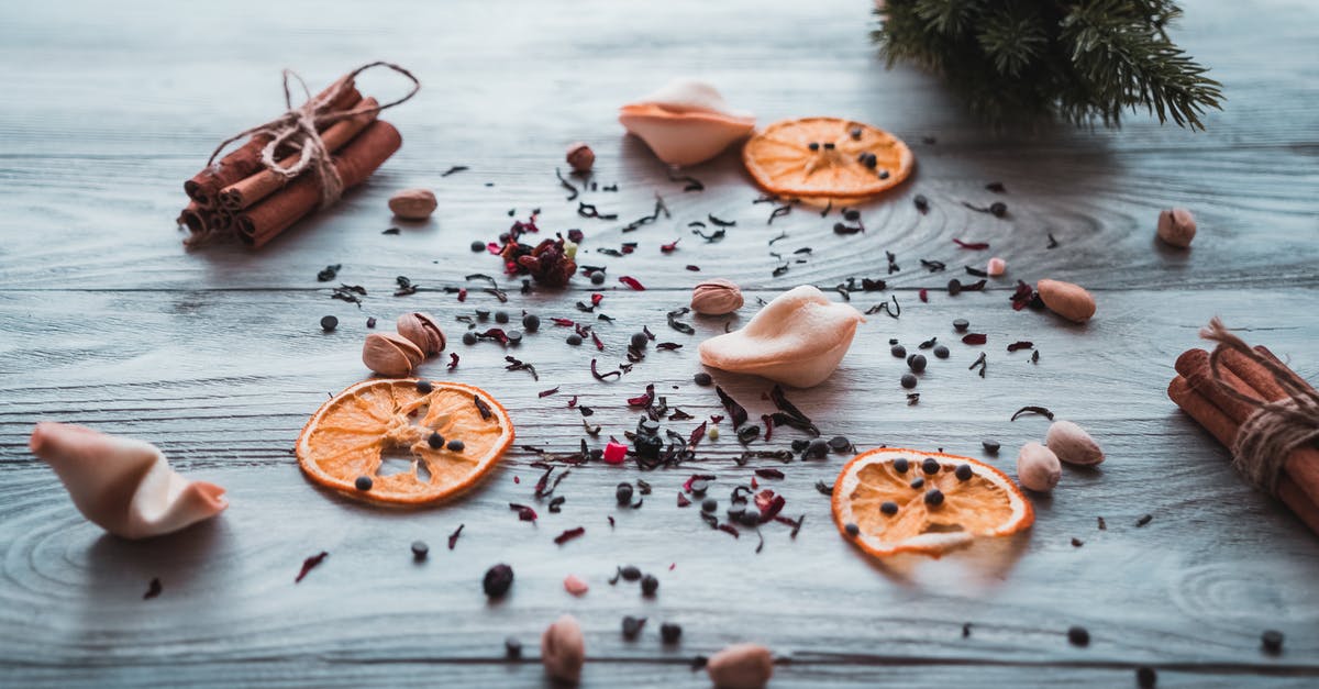 Nuts and raisins don't stick to cookies after baking - Grounded Spices on Wooden Surface