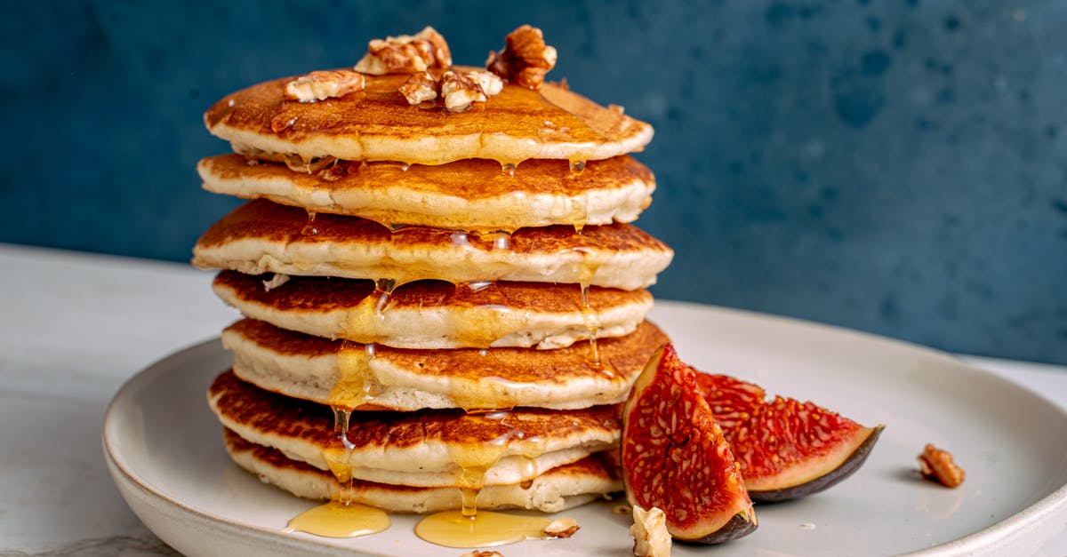 Oatmeal pancake deflates - Pancakes With Sliced Strawberries on White Ceramic Plate