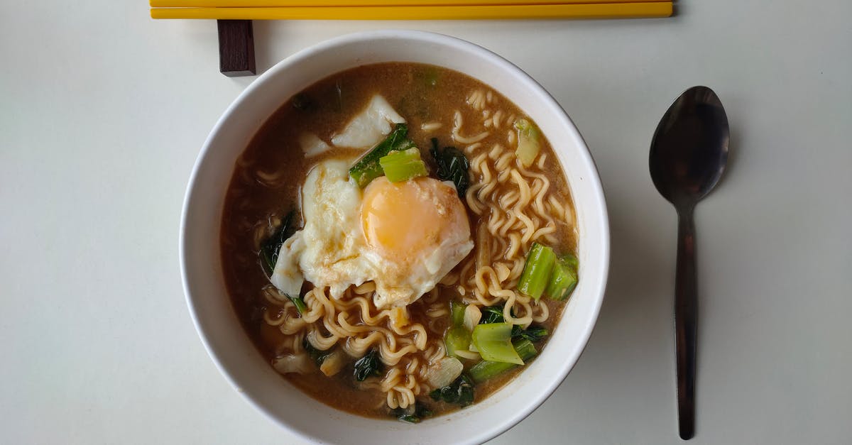 Oil in Ramen broth - Photo Of Noodles On A Bowl 