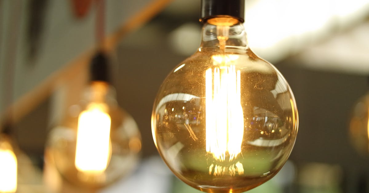 old electric Farberware wok - Lighted Light Bulb in Selective-focus Photography