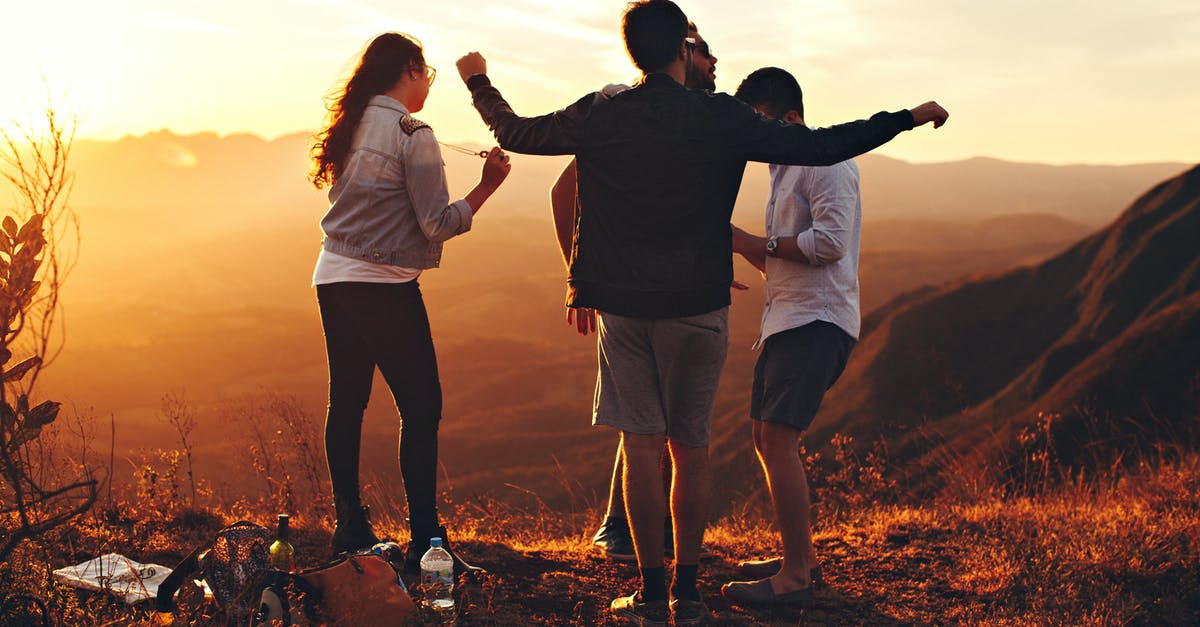 Olive oil "shelf" life and summer camping - Four Person Standing at Top of Grassy Mountain