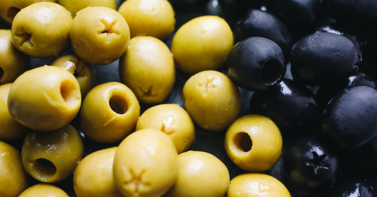 Olives in olive oil - Close-Up Photo Of Olives