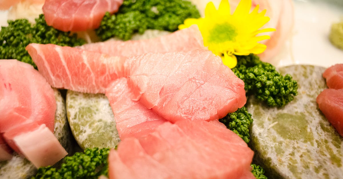 On the topic of eating raw fish and sashimi [duplicate] - Sliced Fresh Tuna on a Platter