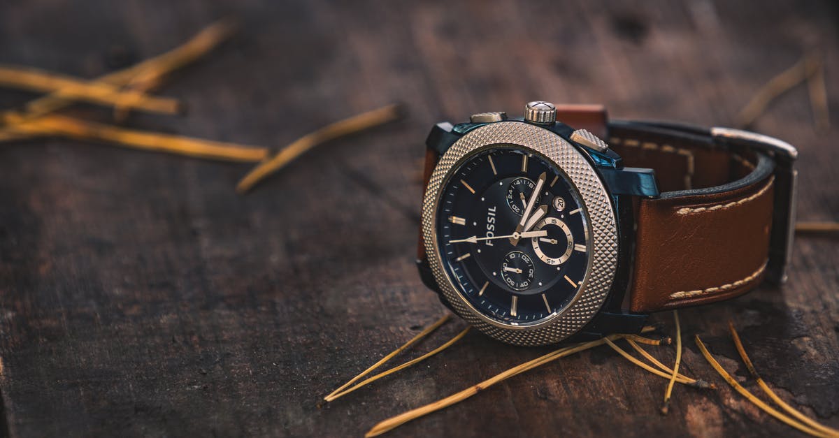 One time sourdough starter - Round Silver Colored Fossil Chronograph Watch With Brown Leather Band On Brown Wooden Surface