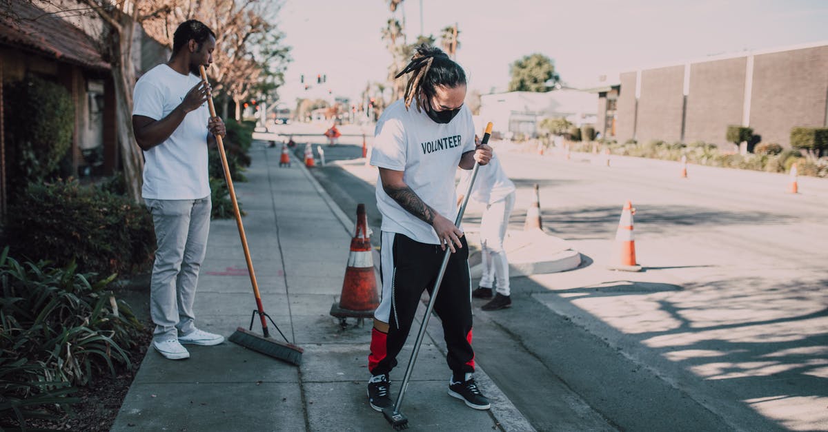 oven cleaning help and tips - Men Cleaning the Street