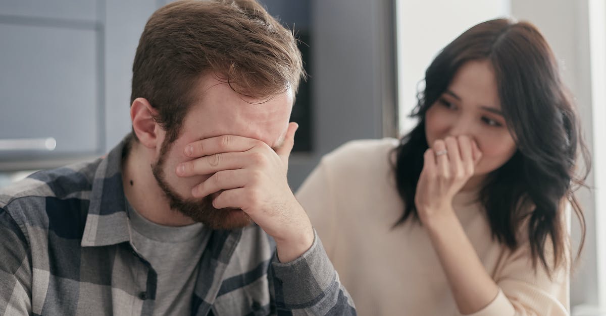 Oven problems in VA - Man in a Plaid Shirt Covering His Face