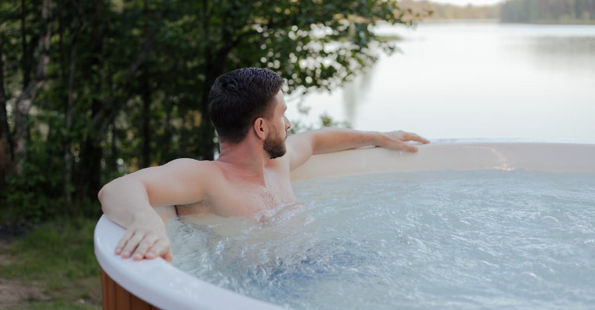 Packaged mozzarella wet - Man in White Bathtub