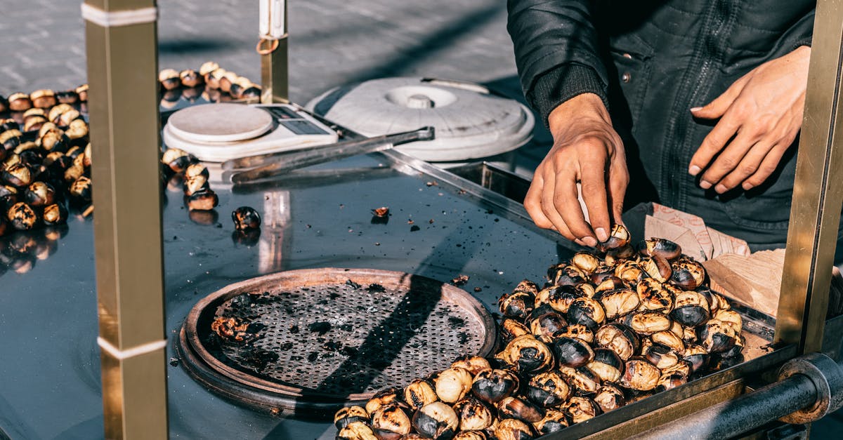 Pan fried chicken taste like pan? - Crop man selling chestnuts on market