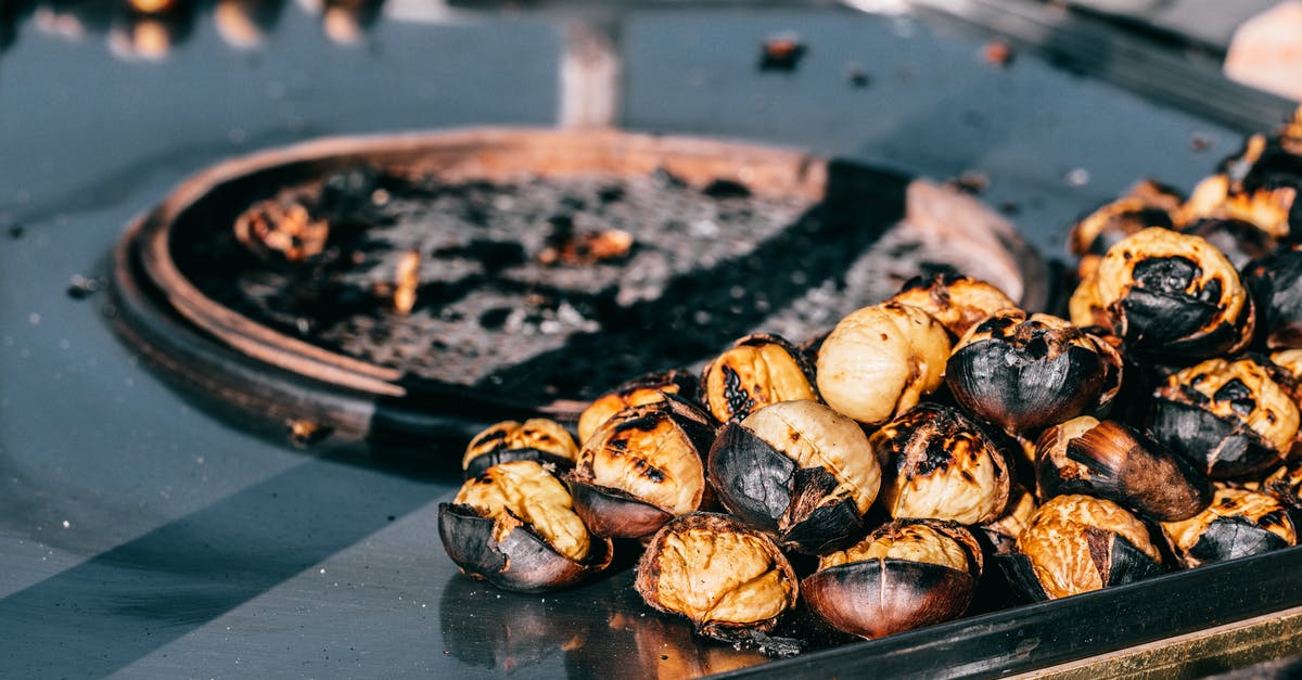 Pan fried chicken taste like pan? - Grilled chestnuts on table in street