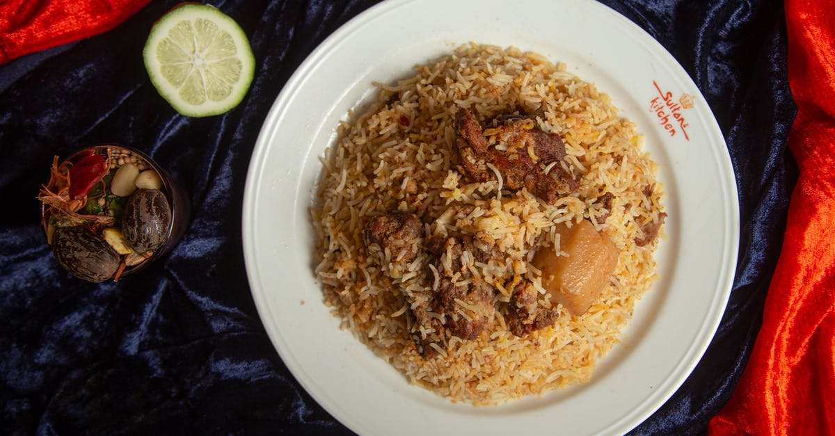 Pasta preservation - Brown Rice on White Ceramic Plate