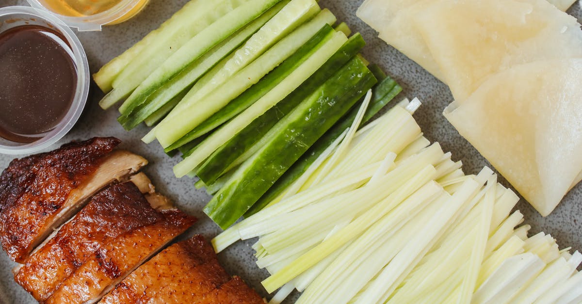 Peking Duck Sauce - Sliced Green Vegetable Beside Fried Duck