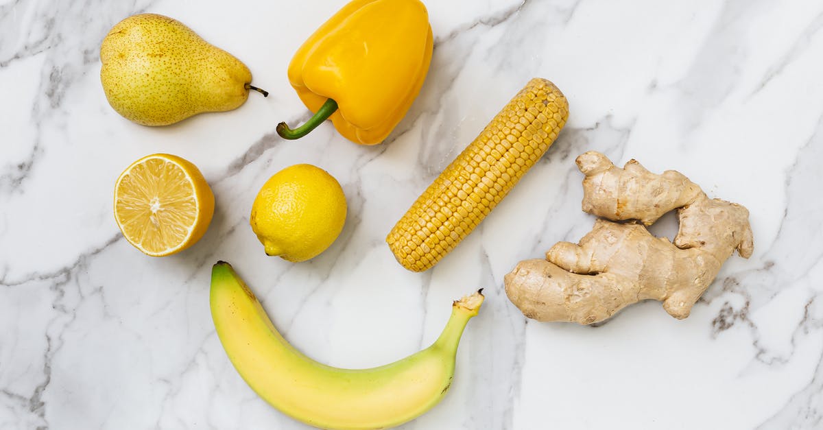 Pepperoncinis vs Banana Peppers - Fruits and Vegetables on the White Surface