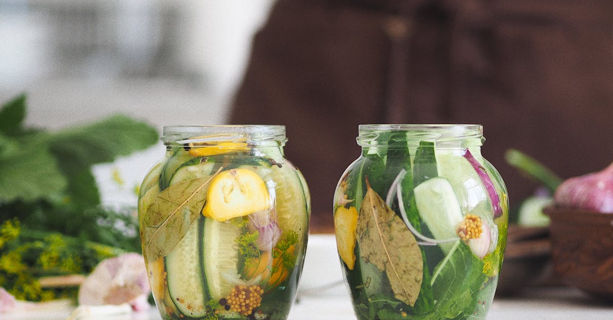 Pickled eggs in a jar. What counts? - Clear Glass Jar With Green Leaves and Vegetables