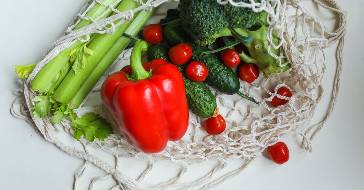 Pickles are really salty (lactic fermenation) - Photo Of Red Pepper Beside Pickles