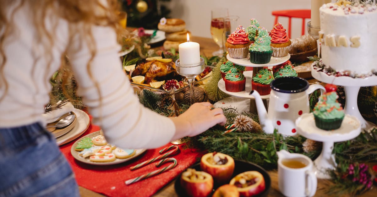 Pie with 2 different fillings - Crop woman preparing stuffed apples on Christmas day