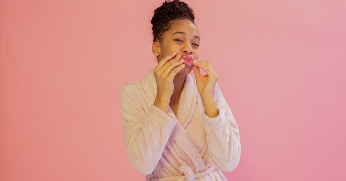 Pink Tinted Quinoa - Beautiful Woman in a Bathrobe in Pink Background