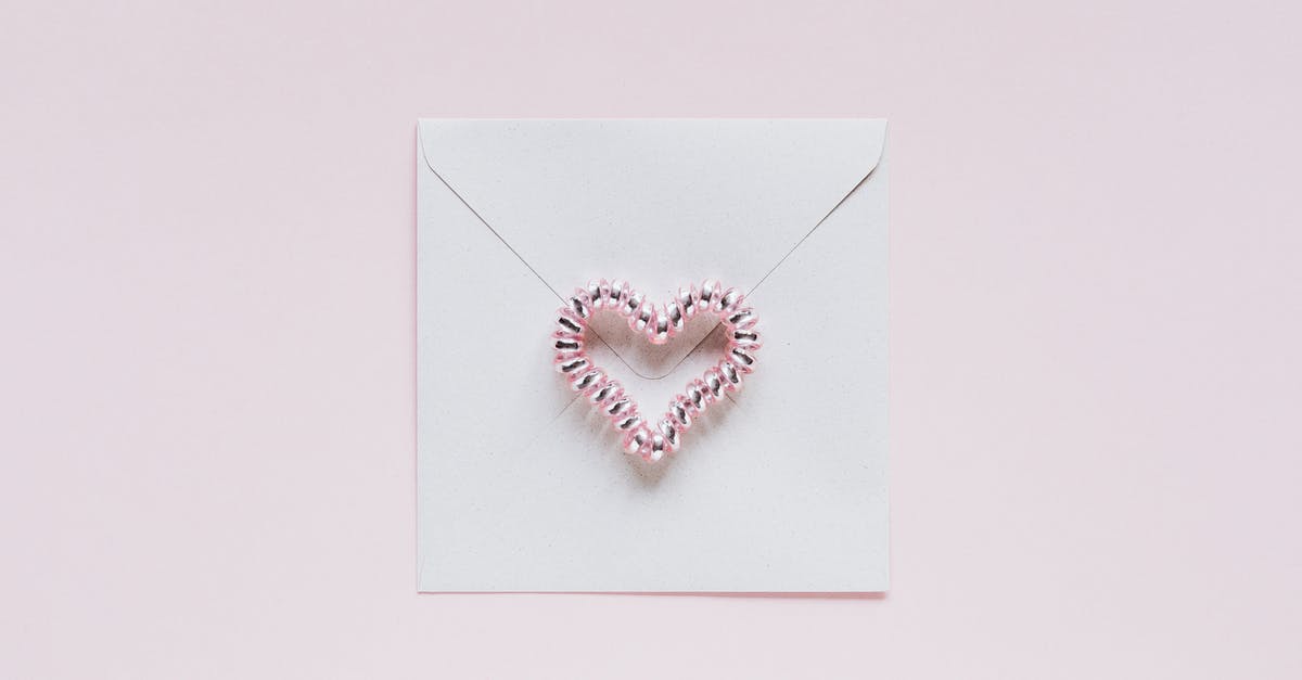 Pitas are paper thin on one side - Envelope with handmade bead heart on San Valentines Day