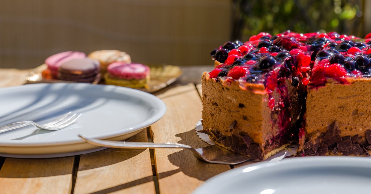 Pitaya Red Velvet Cake became brown - Cake Near White Ceramic Plate on Brown Wooden Table