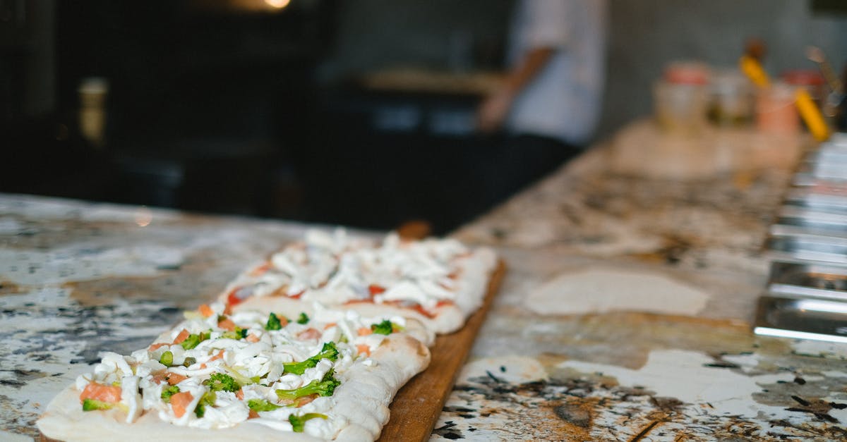 Pizza browning agent substituting proportion - Brown and White Pizza on Brown Wooden Table