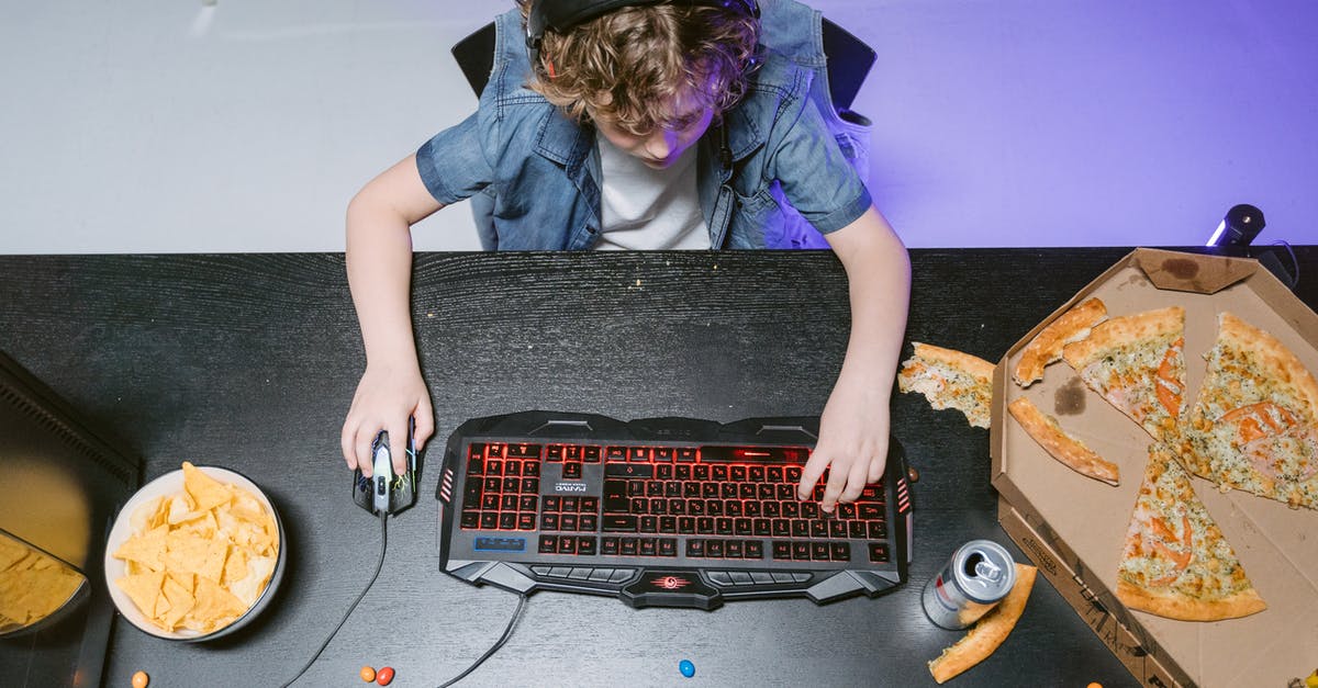 Pizza bulk fermentation vs proofing (2nd cycle) - Woman in Blue Denim Jacket Holding Black Computer Keyboard