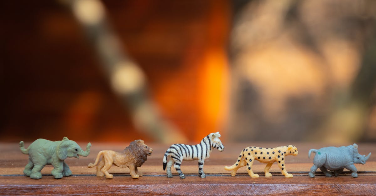 Plastic on grill: is my family safe? - Plastic Animal Toys on Wooden Surface