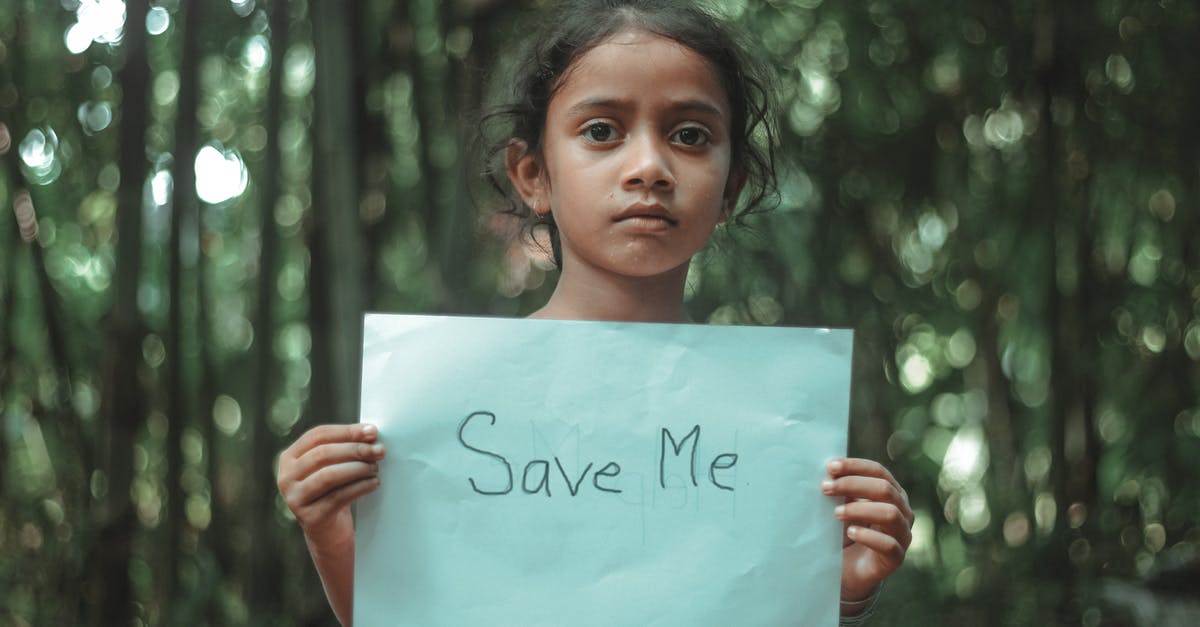 Please can someone help me identify this? - Girl Holding a Blue Paper