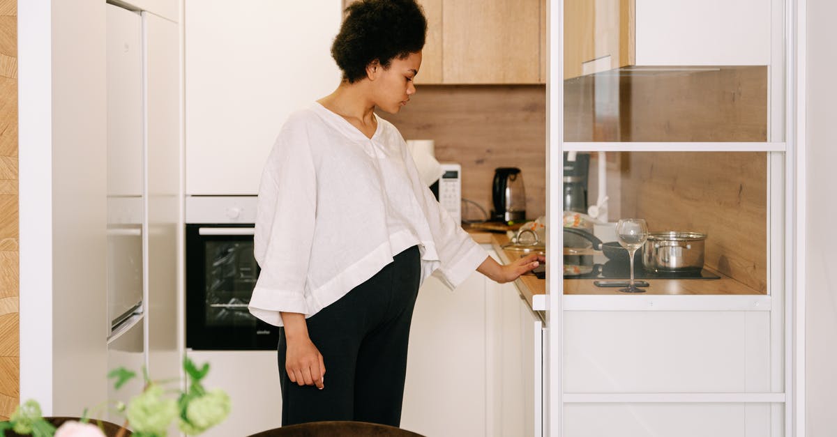 Pot sticking to induction cooktop - A Pregnant Woman in the Kitchen