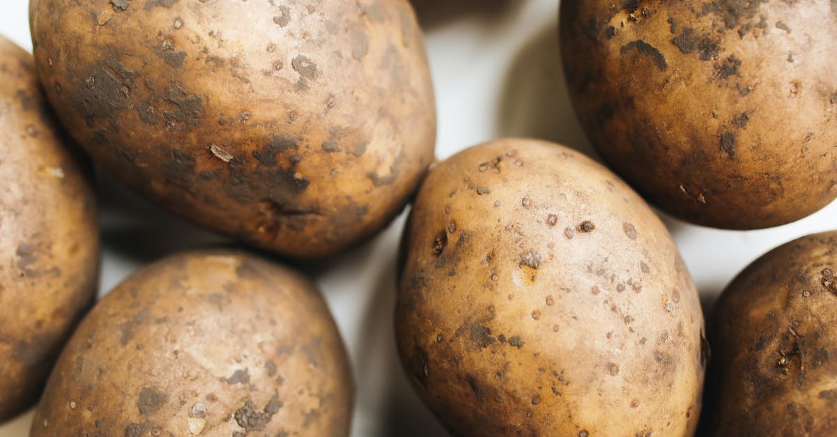 Potatoes boiled with skin on makes less gluey mash? - Close-Up Photo Of Potato