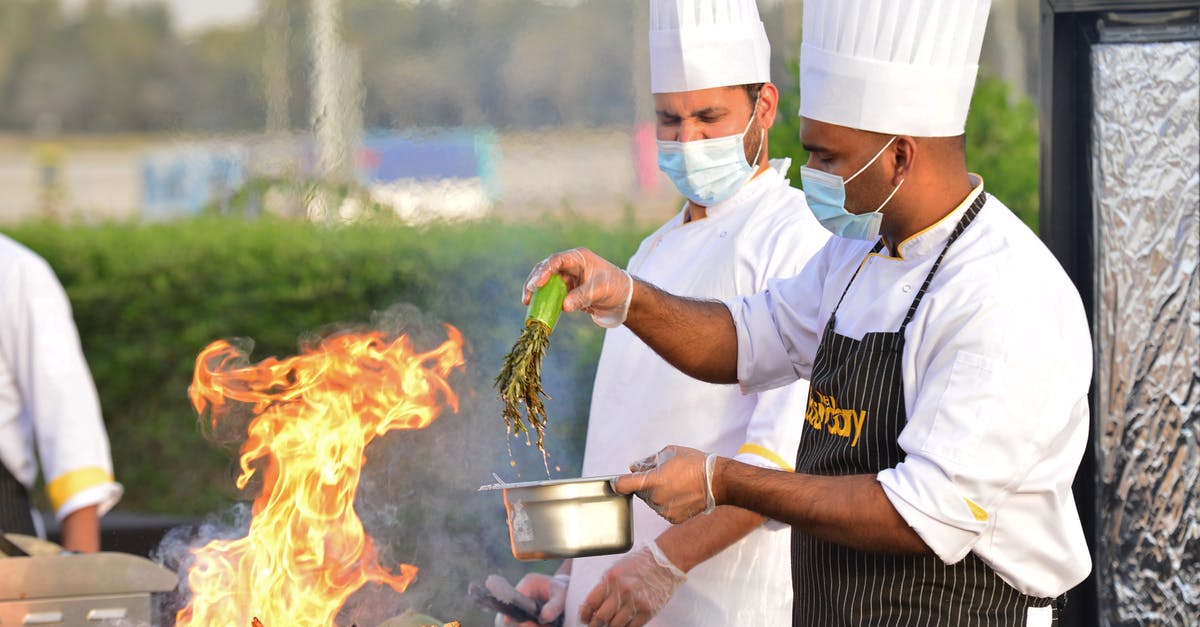 Preparations for outdoor grilling - Chefs Cooking at the Grill