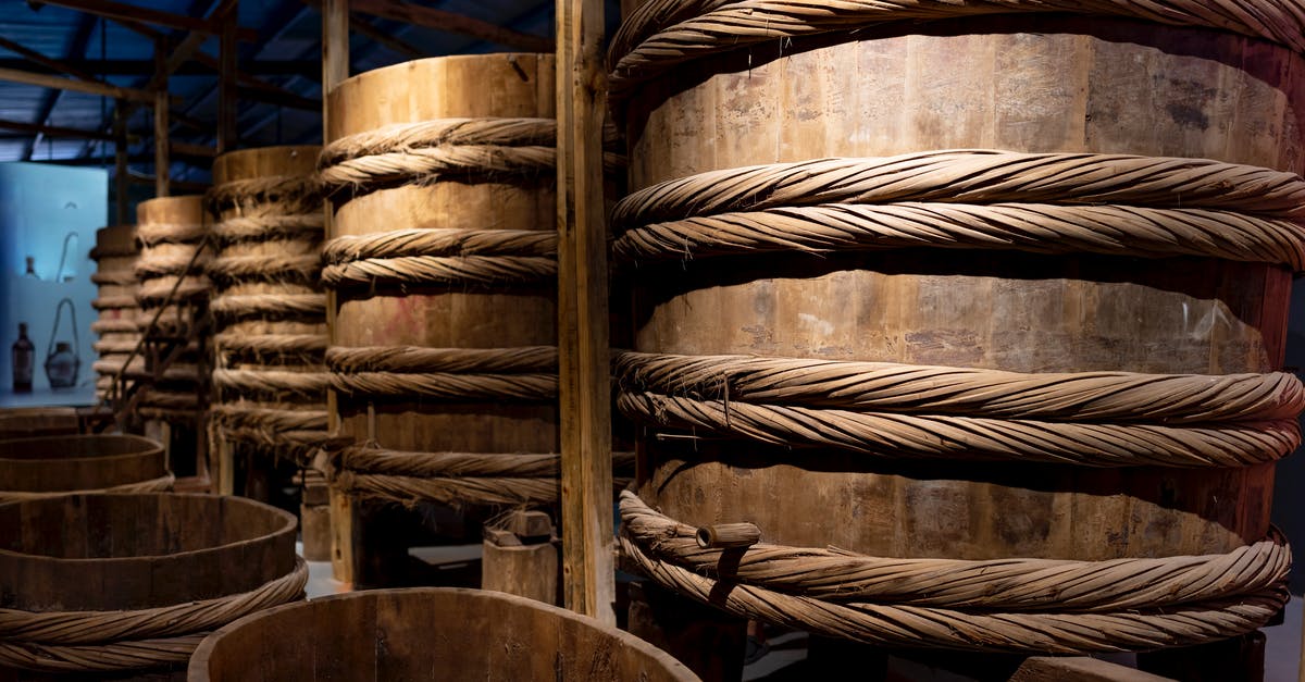 Preparing large cherrystone clams - Wooden barrels for producing fish sauce