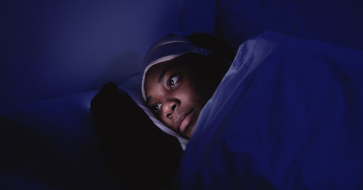 Preparing minced garlic the night before using them - Woman Using a Cellphone during Bedtime