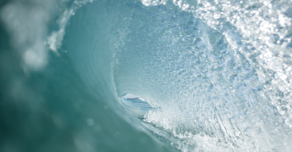 Preparing Salsa Verde fast and fresh - View from swirling fast wave of powerful transparent blue ocean in tropical country